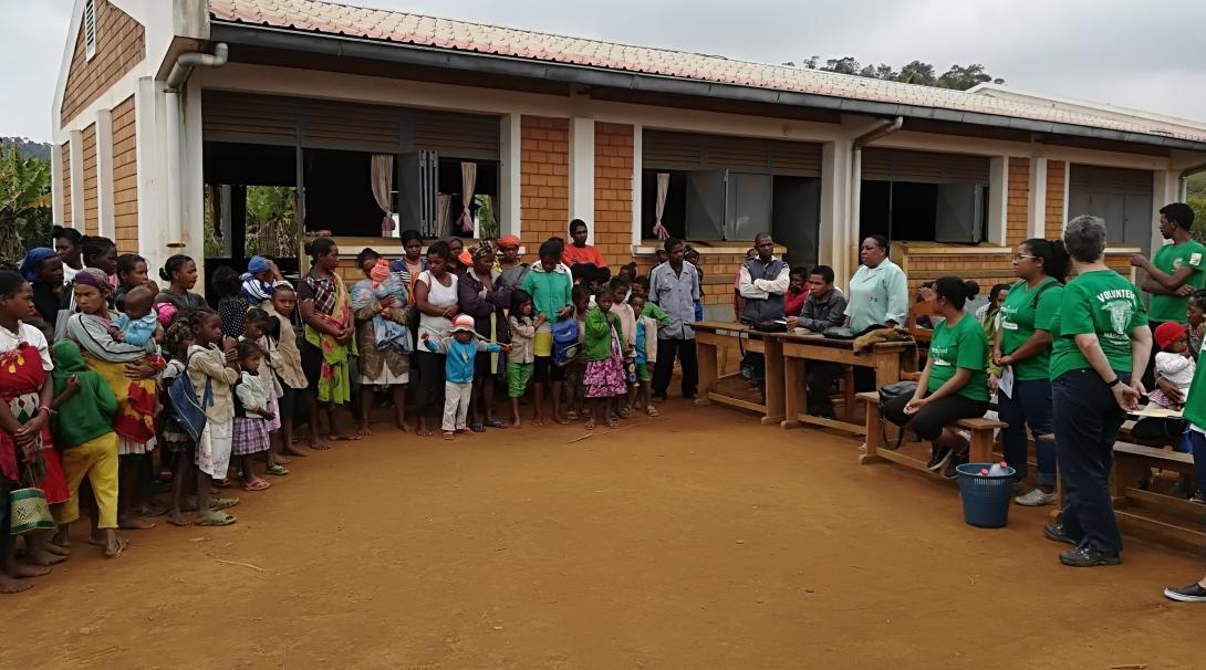 Interns talk to locals regarding the symptoms and prevention of the plague whilst getting work experience on their public health internship in Madagascar. A group of interns are seen talking to locals about the symptoms and prevention of the plague whilst on a public health internship in Madagascar.